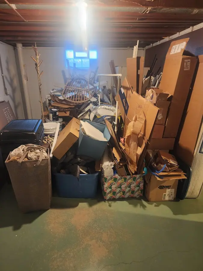 Roll-off dumpster container at job site for 4 Yard Dumpster Rental in Pound Ridge